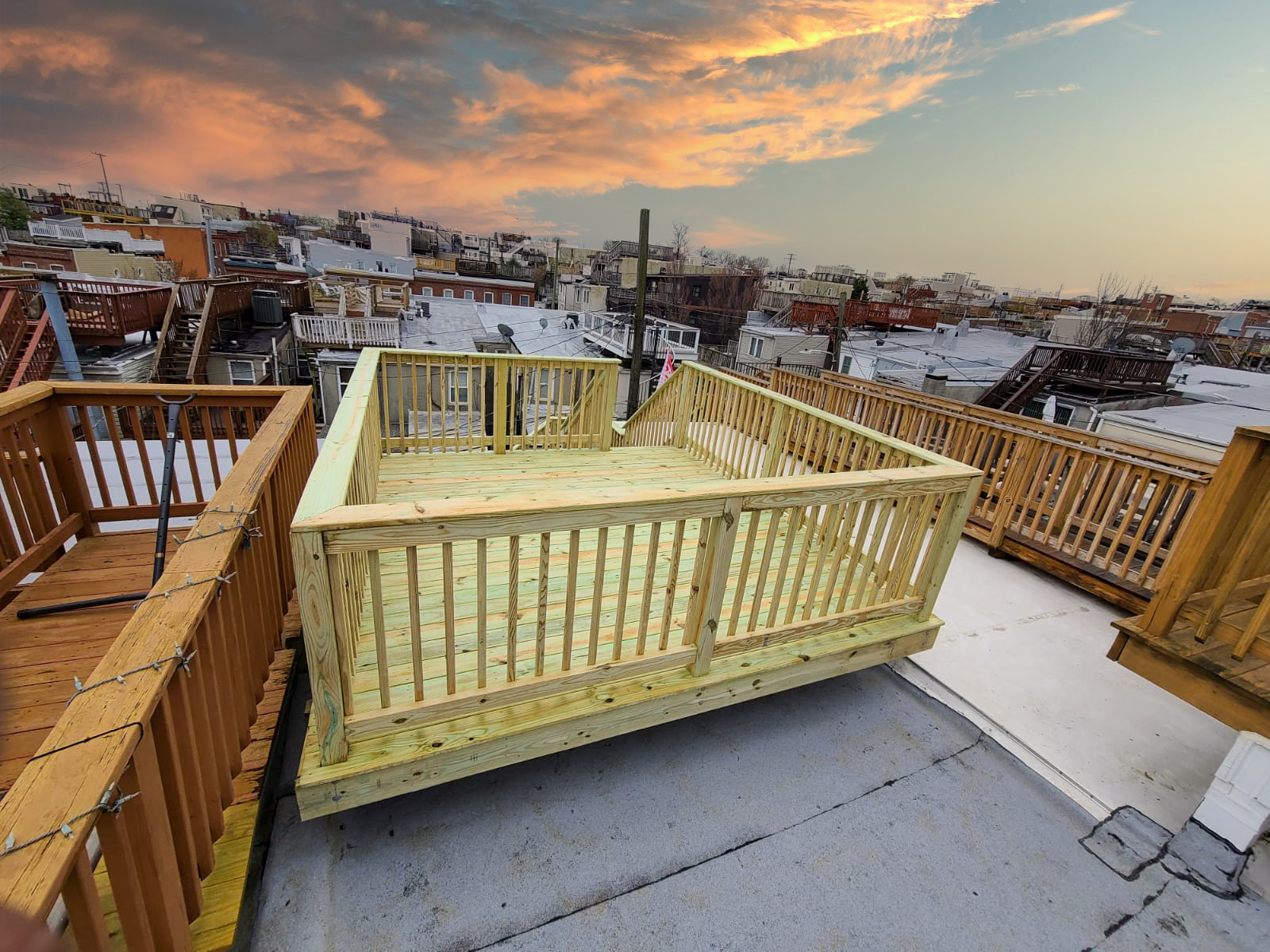 Stunning sunset colors viewed from a newly constructed rooftop deck in Baltimore, MD