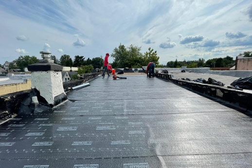 Flat-Roof-Replacement-New-Base-Sheet-Installation