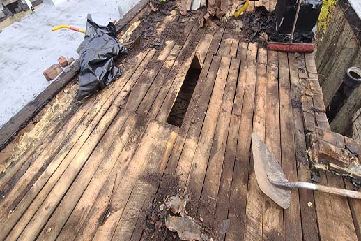 Flat-Roof-Replacement-Old-Roof-Deck-Removal