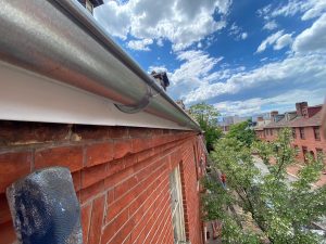 Gutters run along the edge of the roof