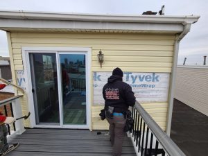 Charm City Roofing Installs New Siding to Replace Damage from a Roof Leak