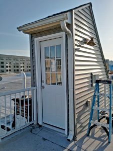 New Siding on a rooftop walkout